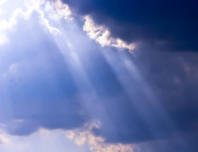 ray of light through the clouds